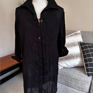 Black swimsuit coverup
Brand new, never worn
